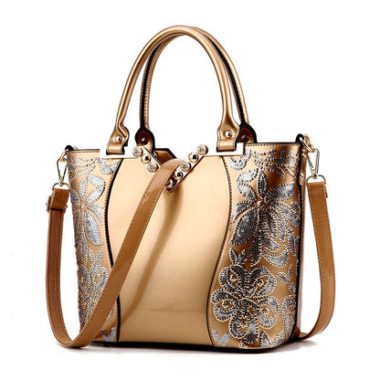 Embroidered bright leather shoulder bag